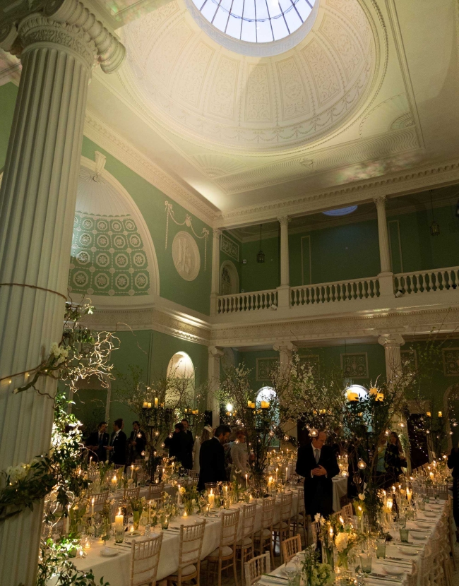 Luxury and timeless wedding at Charlton Park Estate for Natasha Howard and now husband Charlie Quick. Green and ivory wedding decor and whimsical flowers and vines for the wedding reception sit down dinner.