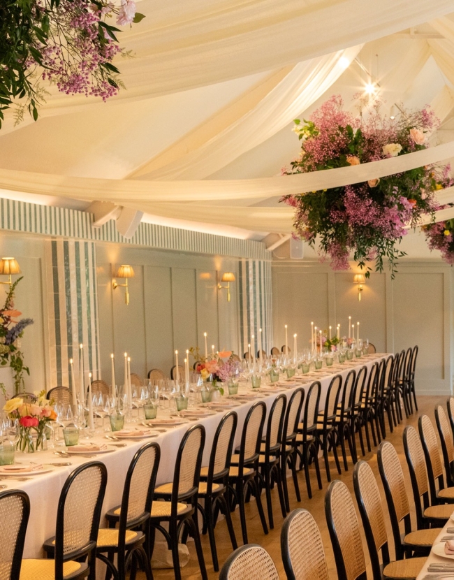 A Kin House wedding with pink and green wedding decor, flower clouds and ceiling drapery by Noble Decor Hire